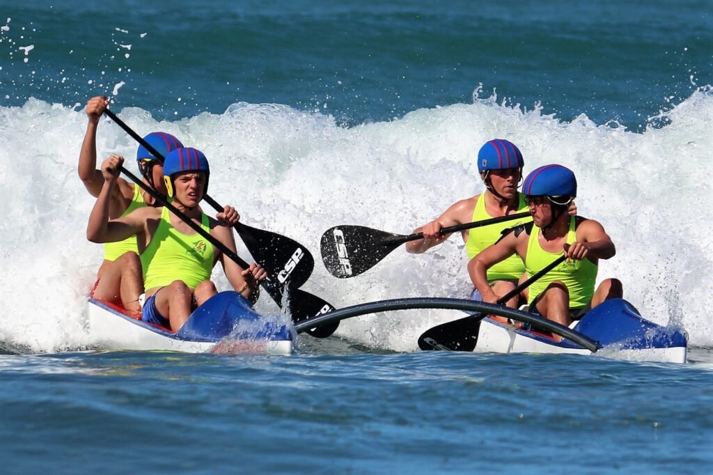 Surf lifesaving club members wearing custom club apparel